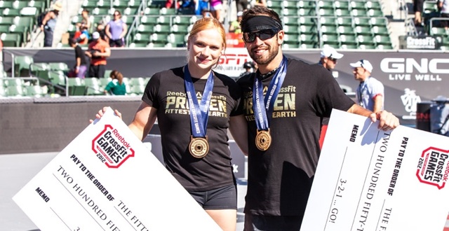 Froning & Thorisdottir with their winning checks